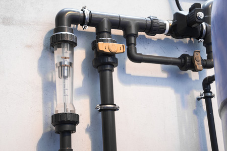 Close up tab water meter on wall