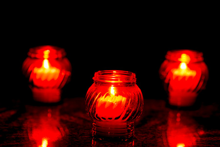 Candles Burning At a Cemetery During All Saints Day. Shallow depth of field.の写真素材