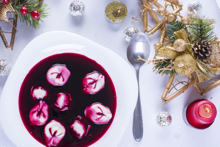 Red borsch with uszka (kind of traditional dumplings), traditional Christmas Eve dishの写真素材