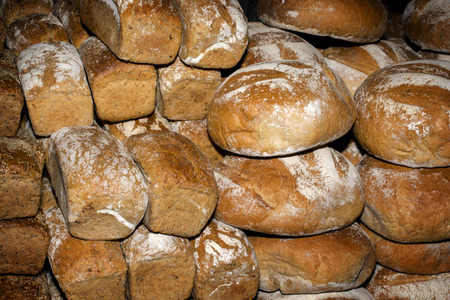 A stack of traditional bread on the street marketの写真素材
