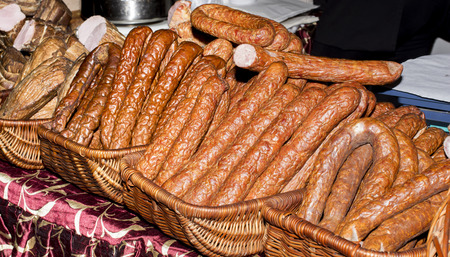 Various types of traditional sausages in basketsの写真素材