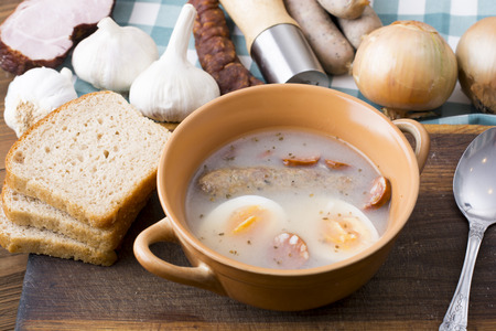 Traditional Zurek with sausage and egg, white borscht, polish Easter soupの写真素材