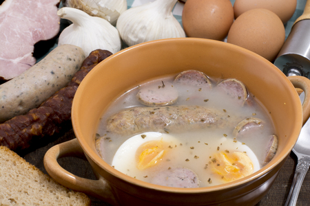 Traditional Zurek with sausage and egg, white borscht, polish Easter soupの写真素材