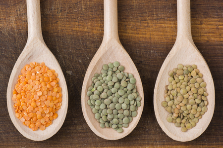 Three kinds of lentil on spoonsの写真素材