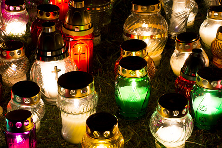 Candles Burning At a Cemetery During All Saints Day.の写真素材