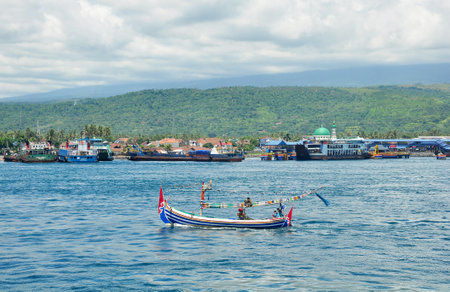 Gilimanuk,Indonesia-February 06,2015: Situation of Gilimanuk harbour with the activities of the ferry,Bali strait and the views of ketapang harbours in East Java.のeditorial素材