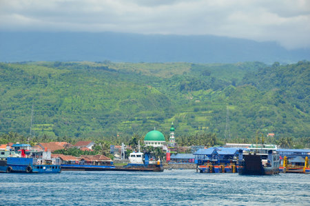 Gilimanuk,Indonesia-February 06,2015: Situation of Gilimanuk harbour with the activities of the ferry,Bali strait and the views of ketapang harbours in East Java.のeditorial素材