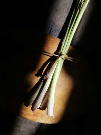 Lemon grass placed on the brown wooden tableの写真素材