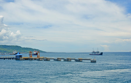 BALI,INDONESIA-FEBRUARY 06 2015: Gilimanuk harbour in west area of Bali,showing the activities of the ferry boats during nice weatherのeditorial素材