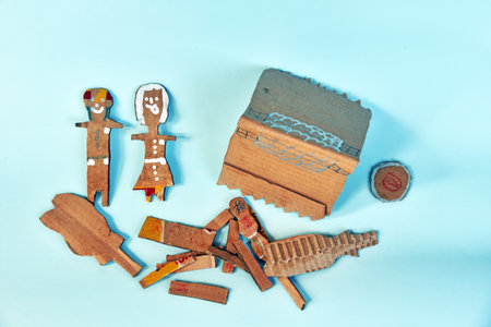 Children handy crafts made from used paper box in many form,isolated on color background