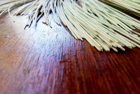 Cleaned,cuted,bamboo sticks,placed on brown wooden backgroundの写真素材