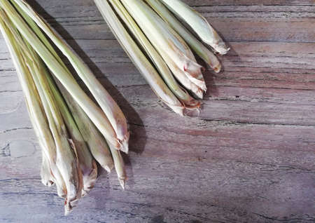 Lemon grass placed on brown wooden backgroundの写真素材