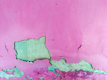 Close up of cracked,weathered,old wall backgroundの写真素材