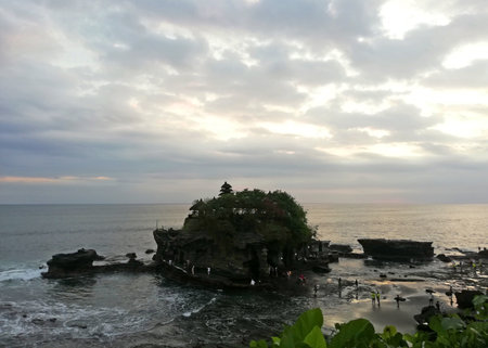 Bali,Indonesia - July 20,2022: Tanah Lot temple in Bali Indonesia, during afternoon time.The temple is one of the most holy temple and famous tourist destination on the islandのeditorial素材