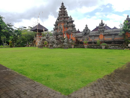 Balinese hindu temple building during a sunny dayの写真素材