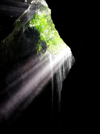Tropical rainforest waterfall in the cave,Thailand.の写真素材