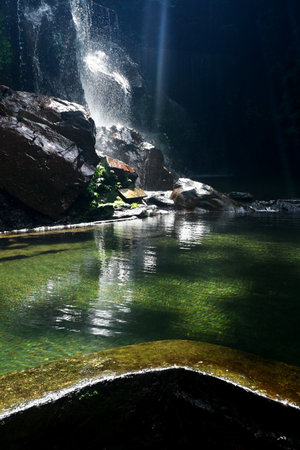 Goa Raja Waterfall, at Bangli regency of Bali, with beautiful green nature landscape surroundingsの写真素材