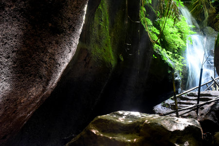 Krisik Waterfall at Bangli regency of Bali, with beautiful nature landscape surroundingsの写真素材