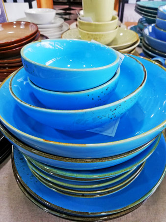 Colorful crockery in the store, closeup of photoの写真素材