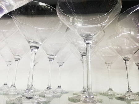 Wine glasses on a table in a restaurant, close-upの写真素材