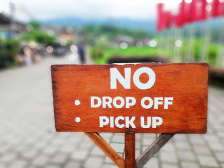 Wooden NO DROP signboard ,with blurry backgroundの写真素材
