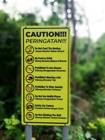 Caution sign in the forest. Caution! Caution!