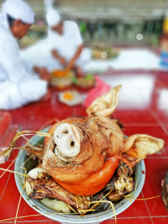 Pig roast on the terrace of a restaurant in India.の写真素材