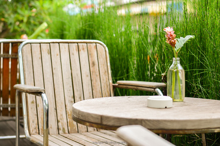 Cozy wood chair in the gardenの写真素材