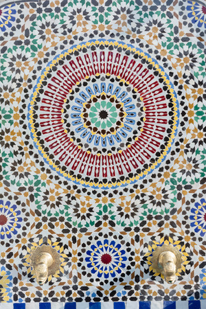 Moroccan style water tap made with handmade mosaicの写真素材