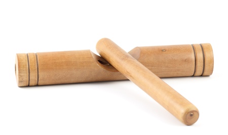 Wooden claves isolated on a white background.の写真素材