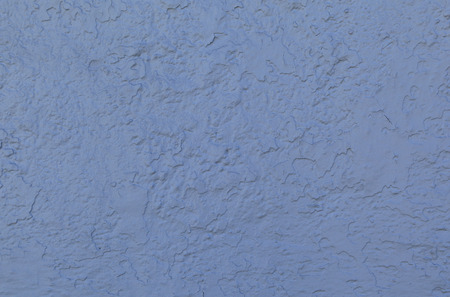 Blue stucco wall forms an irregular pattern that can be used for backgrounds.の写真素材