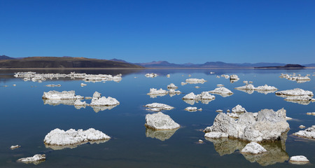 At Mono Lake in California's eastern Sierra, rocky structures called "tufa" form when minerals precipitate from the alkaline water.の写真素材