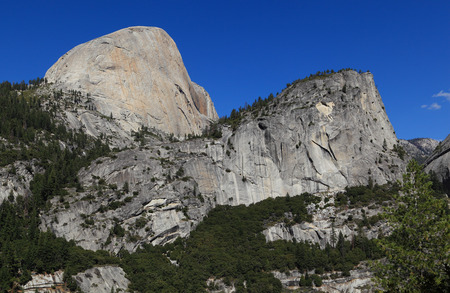 Half Dome (south face) and Mount Broderick. Photographed from the John Muir Trail, Yosemite National Park, California.の写真素材