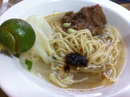 Beef noodle soup with chili garlic and lemon.の素材