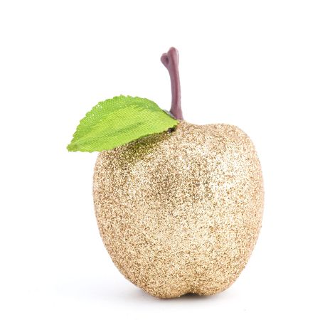 golded apple shaped christmas ornament  の写真素材