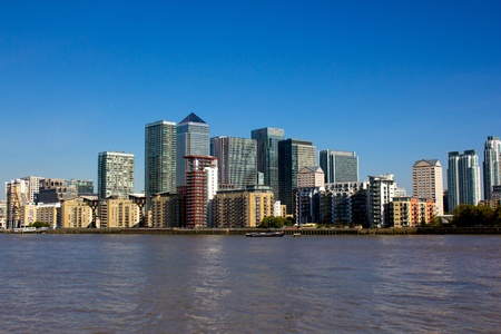 LONDON - October 14: London docklands on a bright day dispite the serious slump in the monetry accounts of many of the large businesses that are based here. October 14, 2011 in London, England.の写真素材