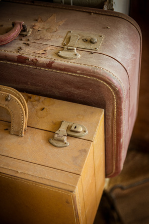 Dusty old set of luggage waiting for the next adventure.の写真素材