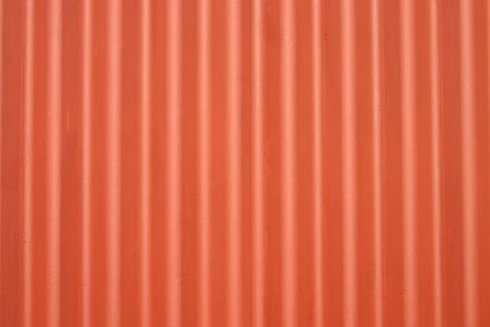 Orange metal corrugated wallの写真素材