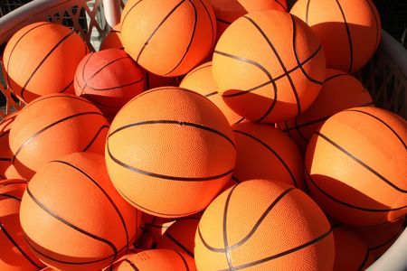 A close up of lots of basketballs.の写真素材