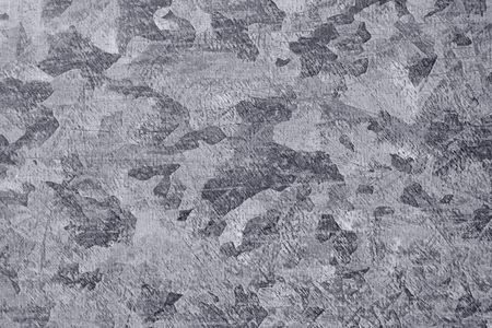 Mottled scratched metal surface