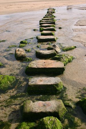 Waliking over stepping stones, Perranporth, Cornwallの写真素材