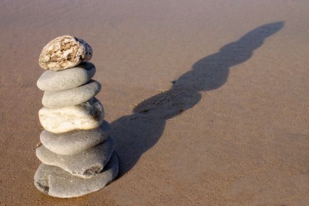 Stones stacked on the beach.の写真素材