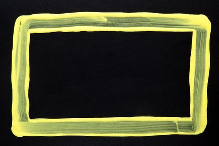 A yellow frame, drawn on a blackboard.の写真素材