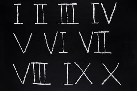 Roman numerals 1 to 10 written on a blackboard.の写真素材