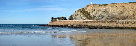 Panoramic view of Portreath pier and the Pepper Pot in Cornwall, UK.の写真素材