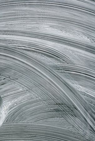 Close up of white paint smeared on a closed shop window.の写真素材