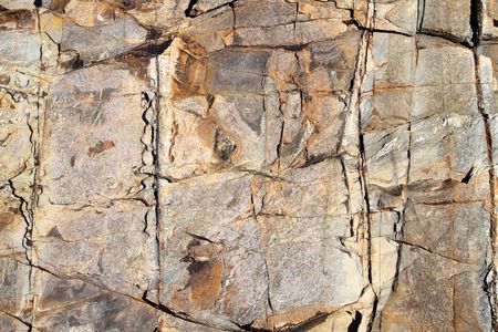 Large eroding rock face close up.