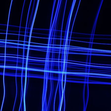 Bright blue LED light trails abstract.