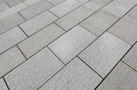 Large grey paving slabs close up.の写真素材