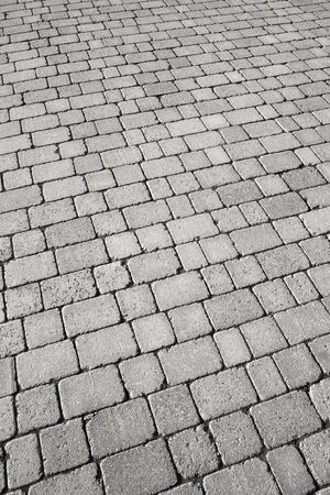 Black and white cobblestone street close up.の写真素材
